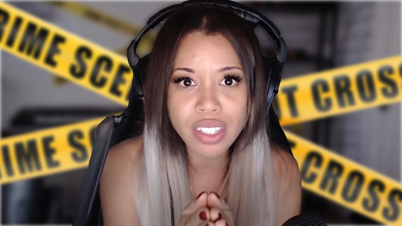Boze in front of yellow caution tape.