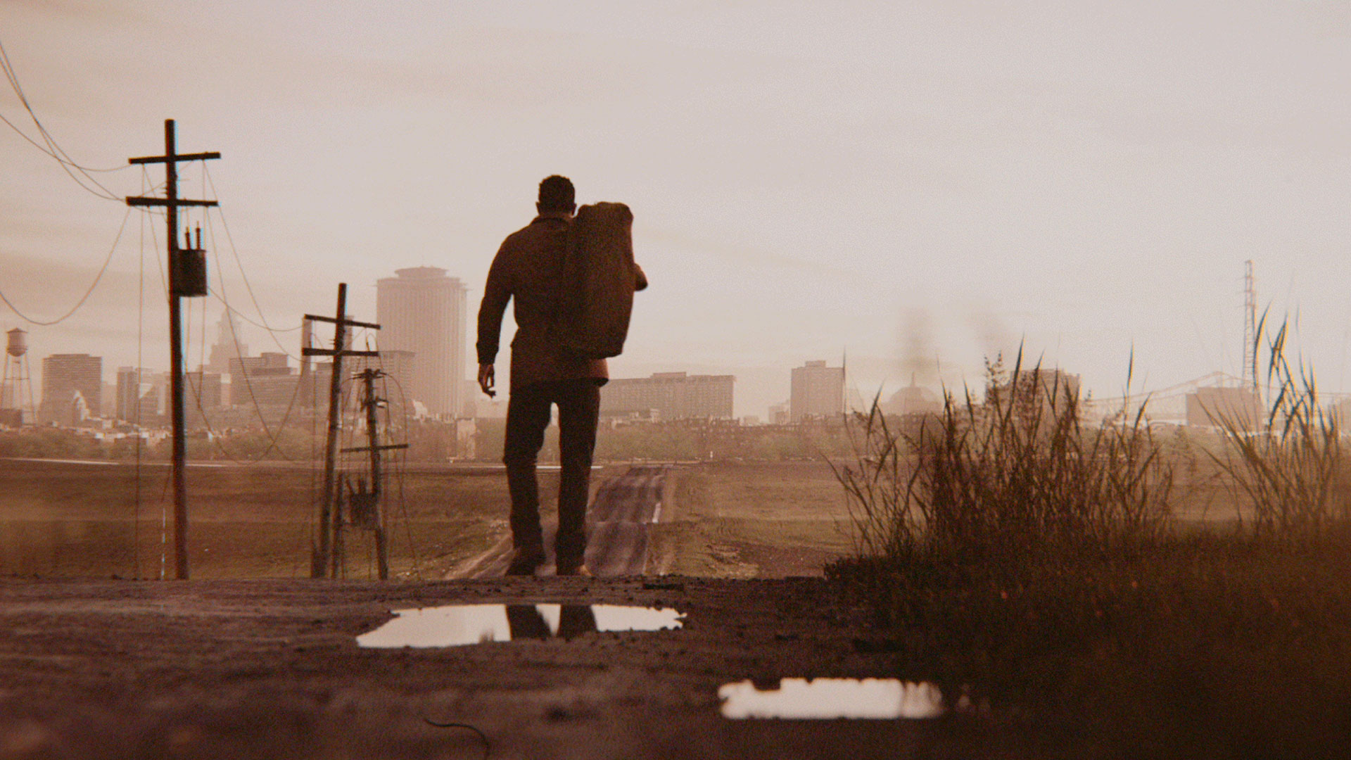 Mafia 3's protagonist walking away from the camera towards a town.