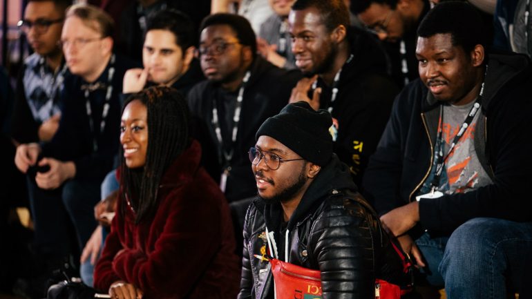 A group of black gamers seated together